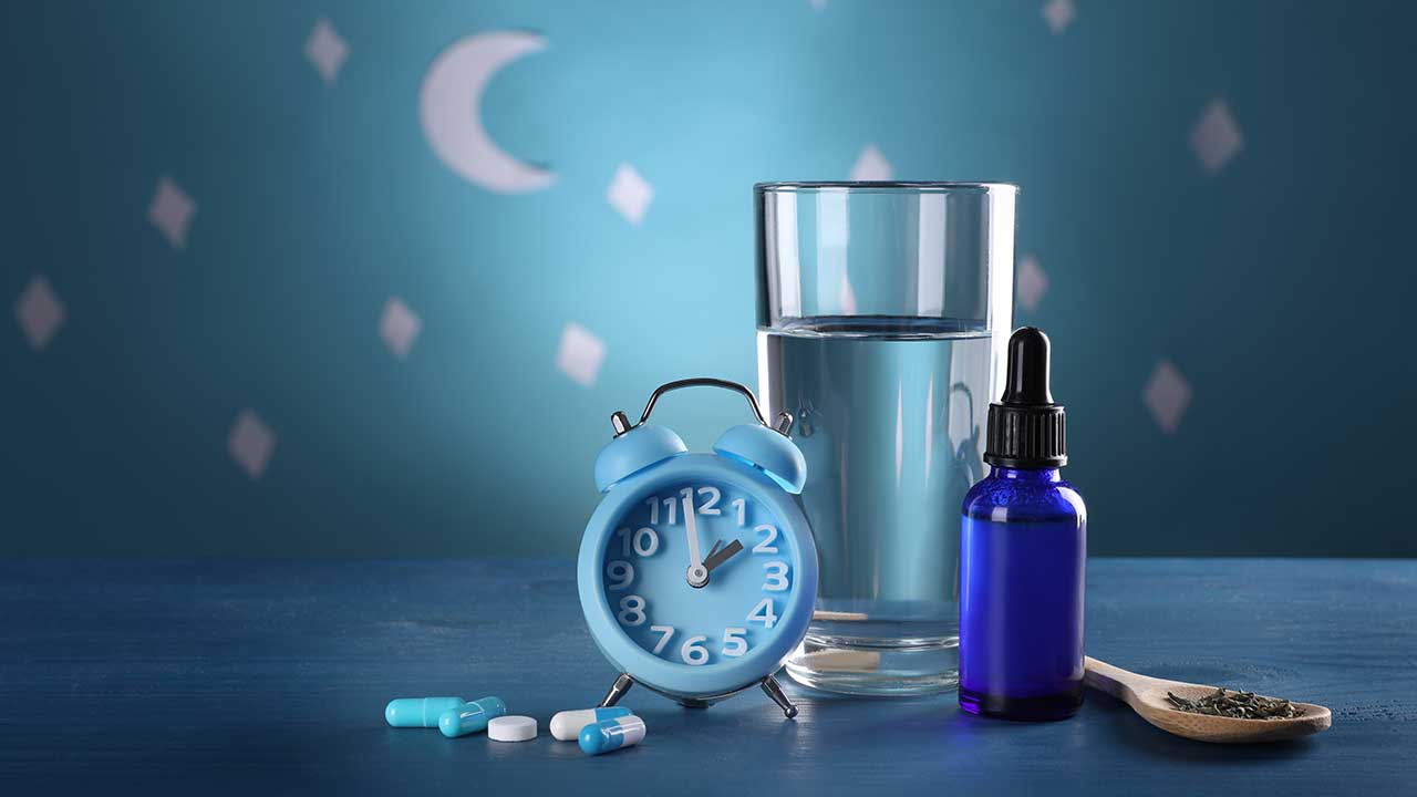 despertador y medicamentos para dormir